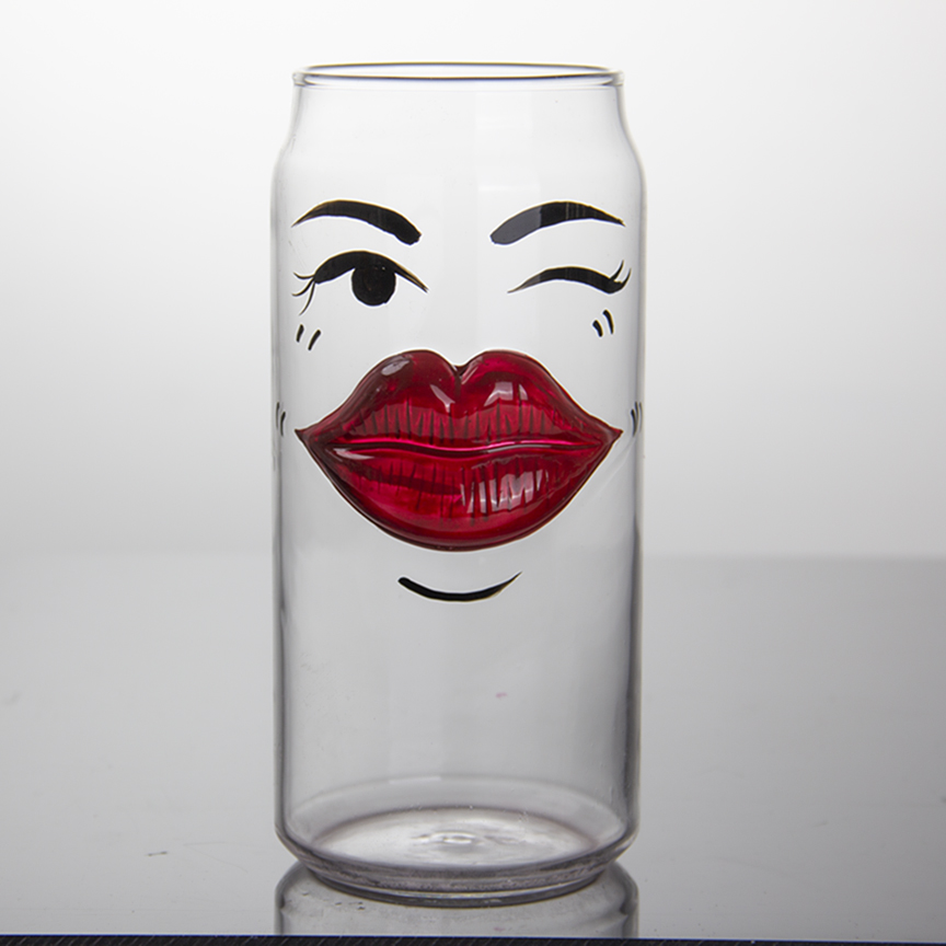 A glass with an exaggeratedly large mouth with a design element